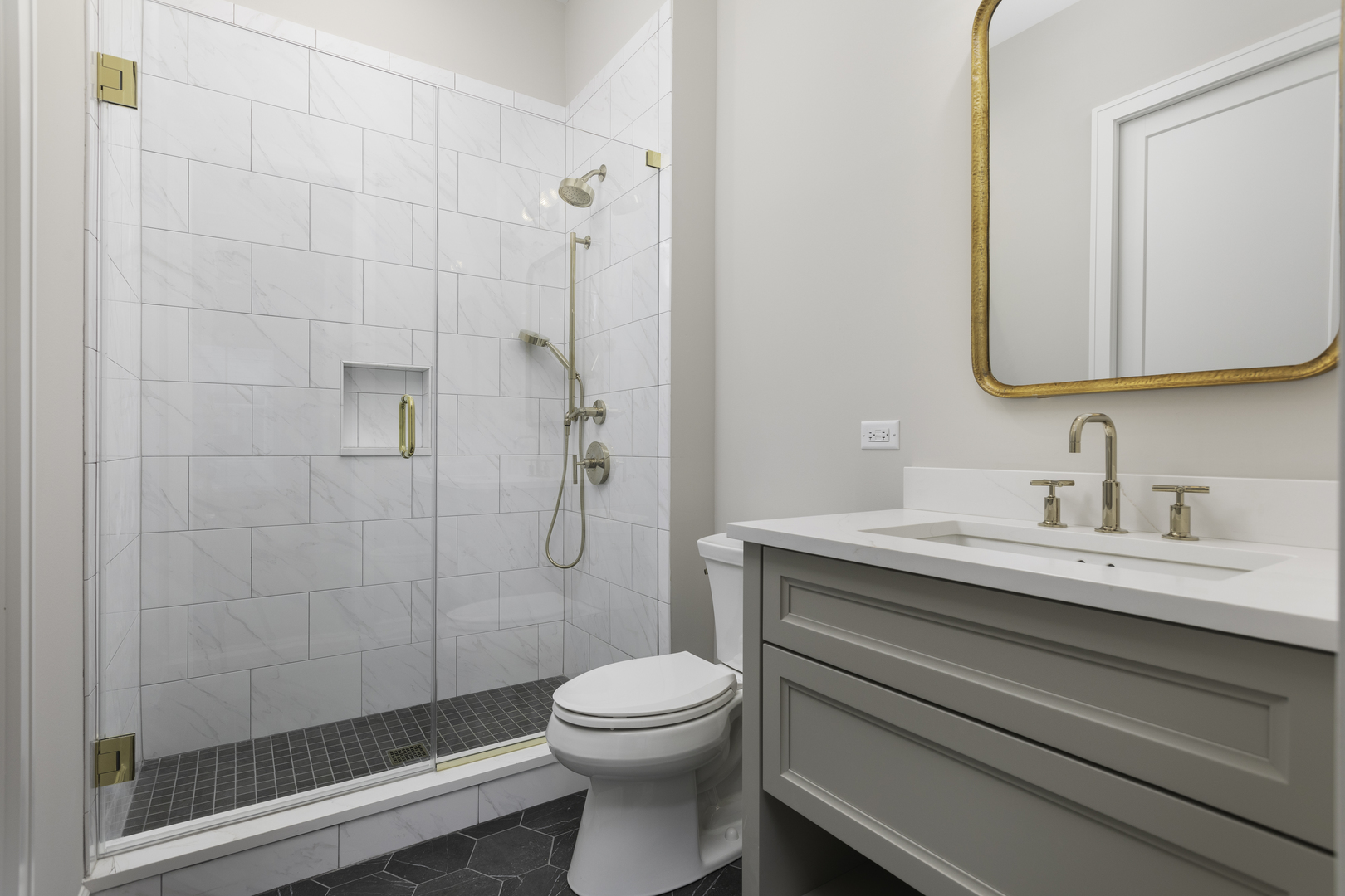 845 Tulip Lane Naperville, IL 60540 - Photo 33 of 40 a bathroom with a granite countertop sink toilet a mirror and shower