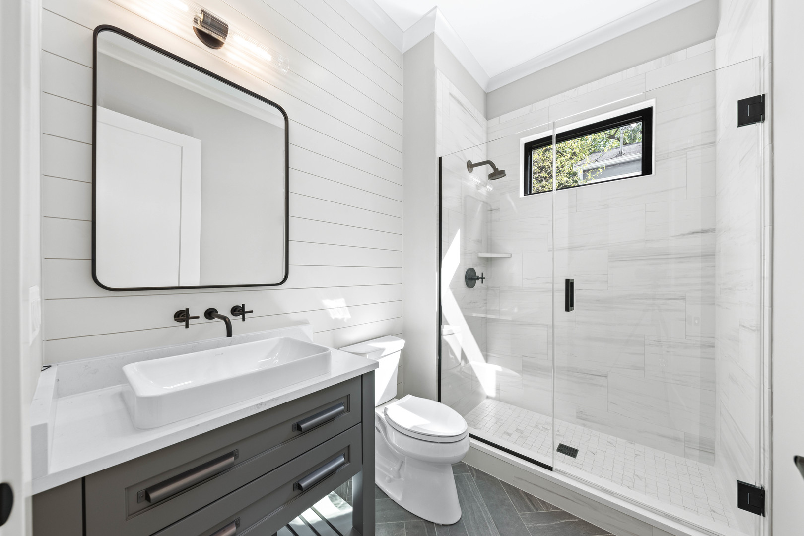 845 Tulip Lane Naperville, IL 60540 - Photo 38 of 40 a bathroom with a toilet a sink and glass door