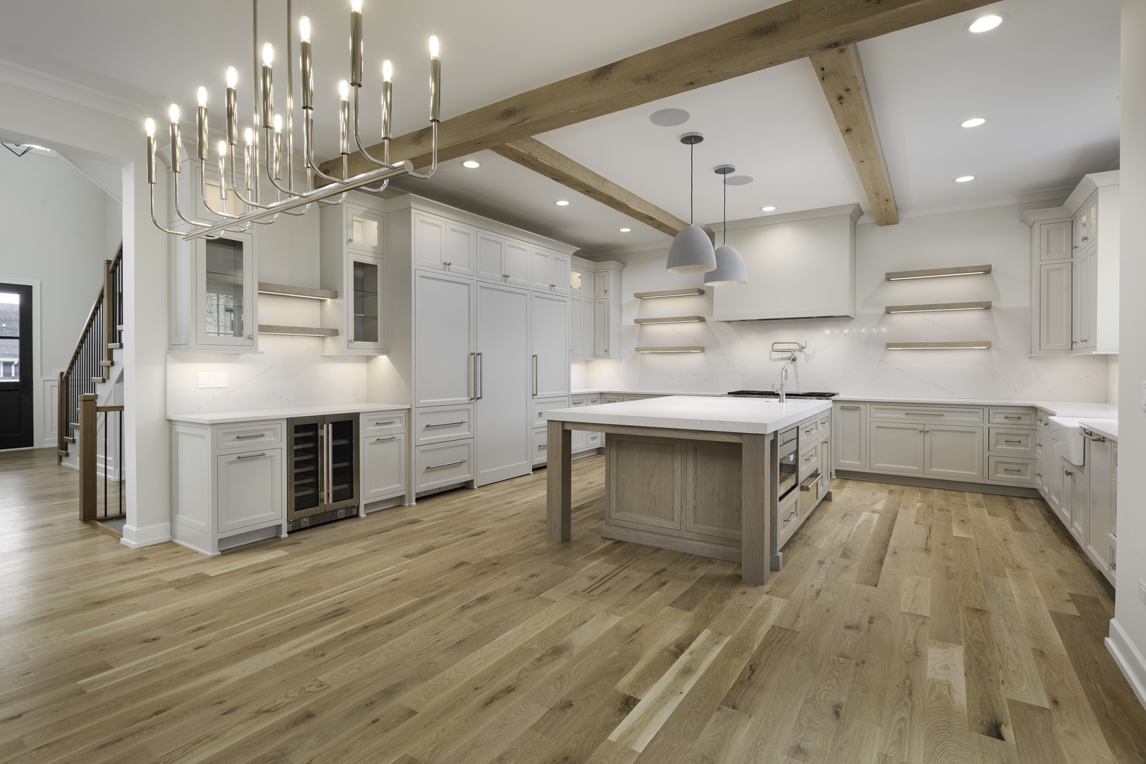 845 Tulip Lane Naperville, IL 60540 - Photo 4 of 40 a large kitchen with stainless steel appliances a large counter top a sink a stove and a refrigerator