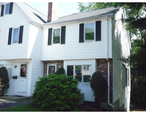 40 Bennett Street, Unit 1 Wakefield, MA 01880 - Photo 1 of 1 a view of a house with a backyard