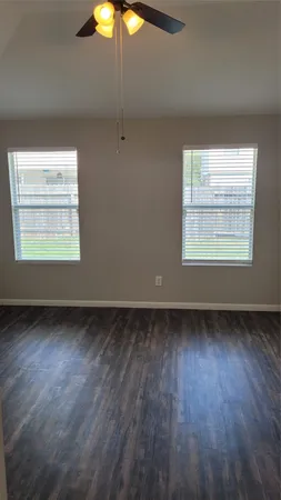 a view of an empty walk in closet