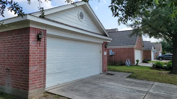 a view of a back yard of the house