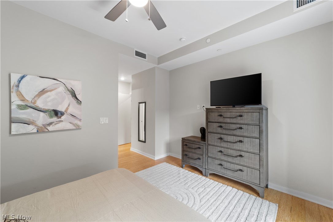 2044 Random Road, Unit 101 Cleveland, OH 44106 - Photo 18 of 44 Bedroom featuring light wood-type flooring and ceiling fan