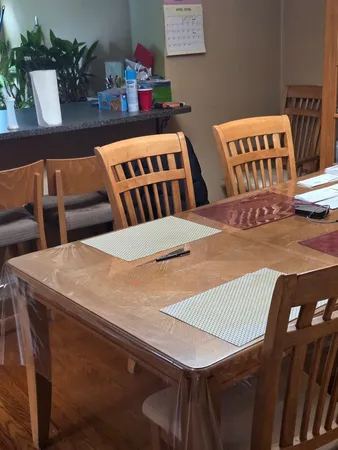 a view of a dining room with furniture