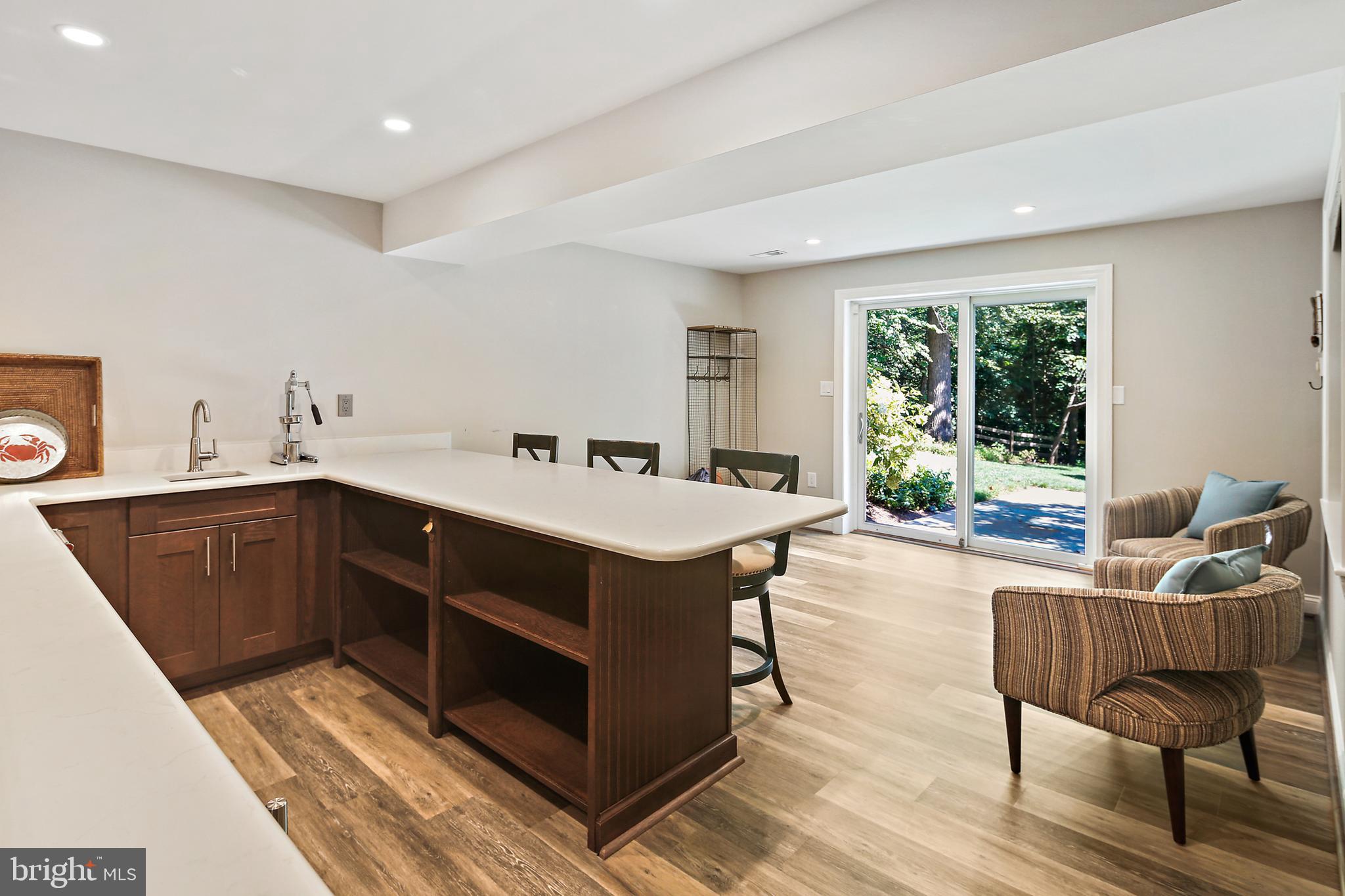 535 Post Oak Road Annapolis, MD 21401 - Photo 54 of 76 Wet Bar with Lower Level Walk-Out to Rear Yard