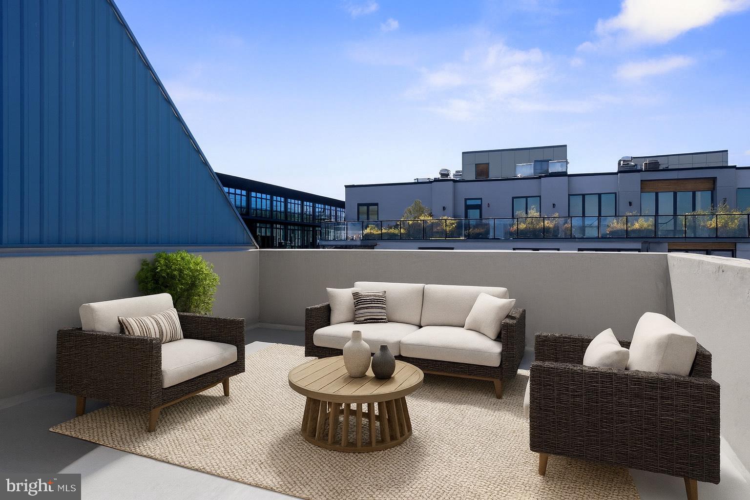 231 West Thompson Street Philadelphia, PA 19122 - Photo 38 of 48 Virtually Staged version of Roof Deck!