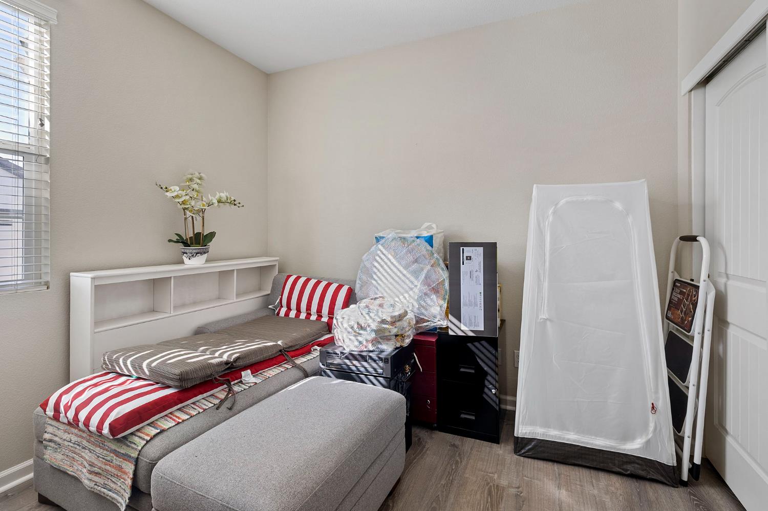 7525 Eldred Way Sacramento, CA 95829 - Photo 15 of 38 bedroom with wood finished floors and baseboards