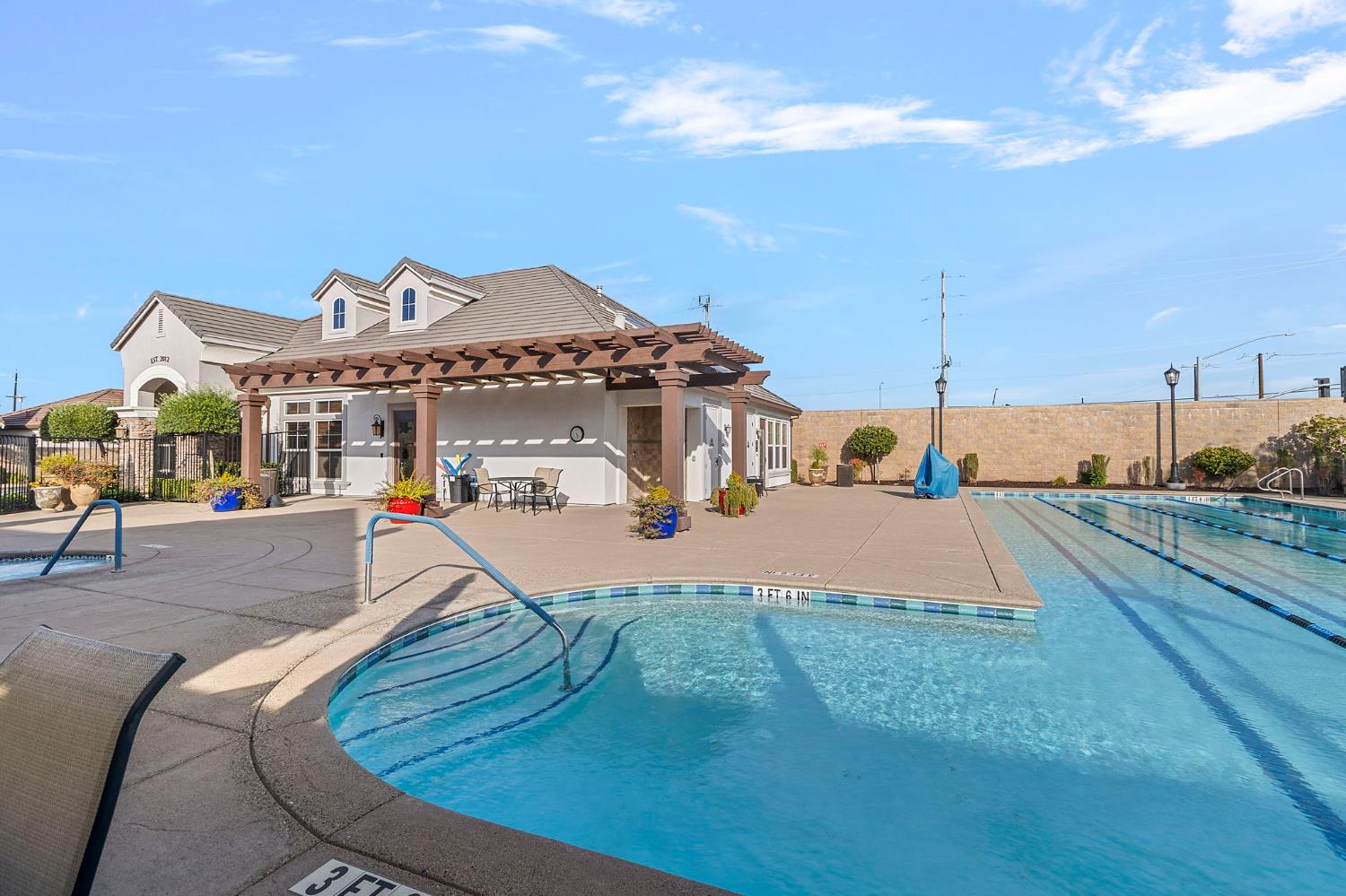 7525 Eldred Way Sacramento, CA 95829 - Photo 32 of 38 community pool featuring a pergola and a patio