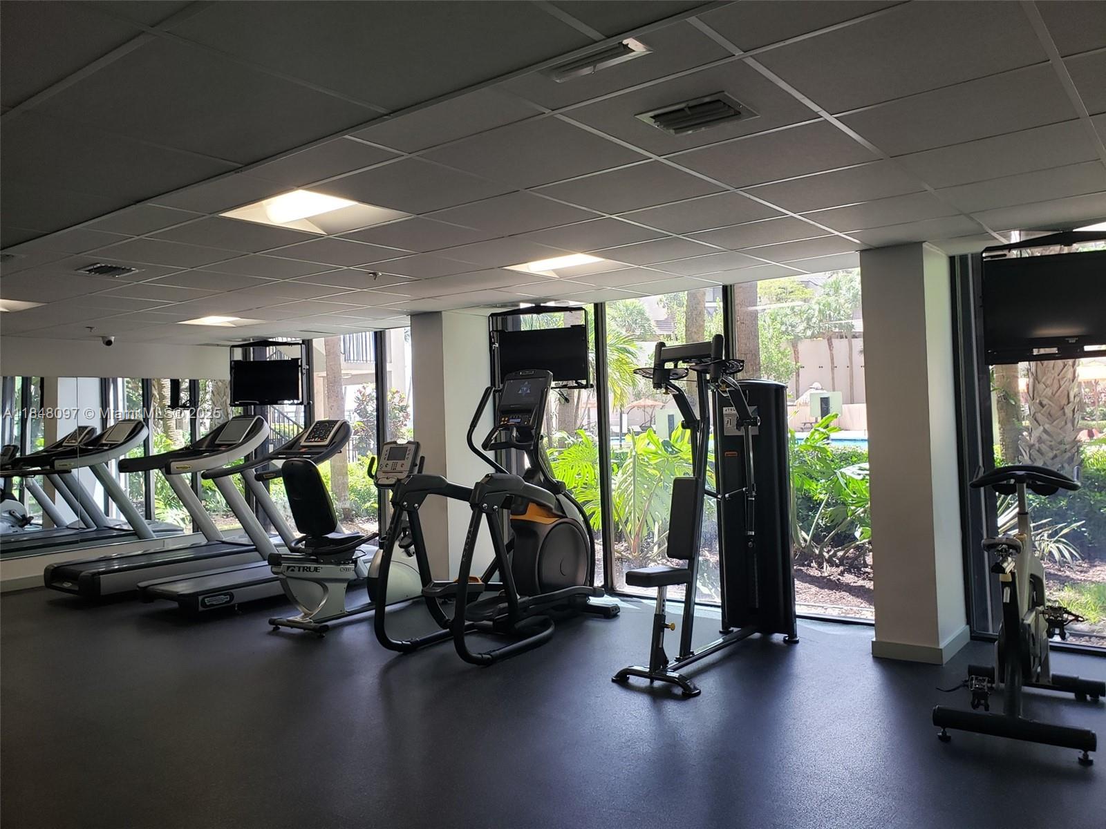 540 Brickell Key Drive, Unit 1524 Miami, FL 33131 - Photo 26 of 44 a view of a room with gym equipment