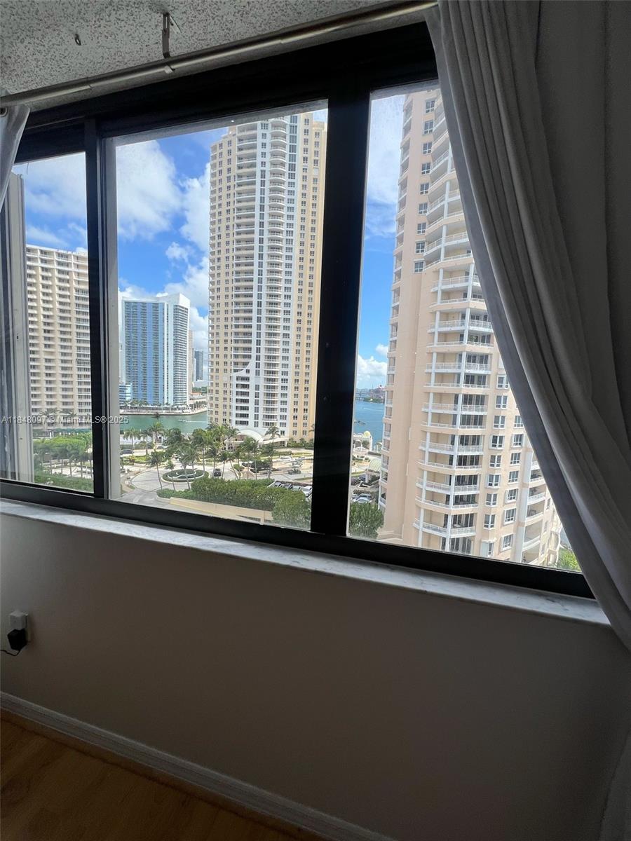 540 Brickell Key Drive, Unit 1524 Miami, FL 33131 - Photo 9 of 44 a view of a room that has a large window