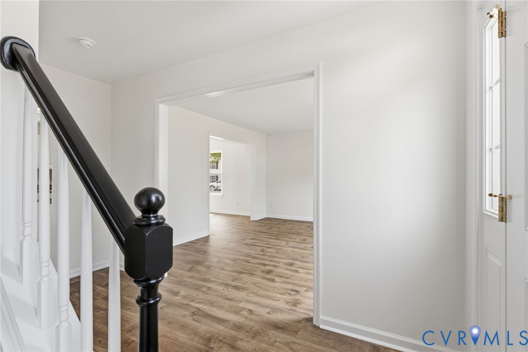 3230 Ransom Hills Road North Chesterfield, VA 23237 - Photo 10 of 27 Foyer with new flooring, new lighting and coat clo