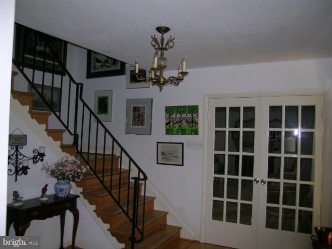 13900 Alderton Road Silver Spring, MD 20906 - Photo 4 of 11 Elegant entry foyer with hardwood floors.