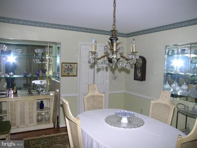 13900 Alderton Road Silver Spring, MD 20906 - Photo 5 of 11 Formal dining room with chair rails