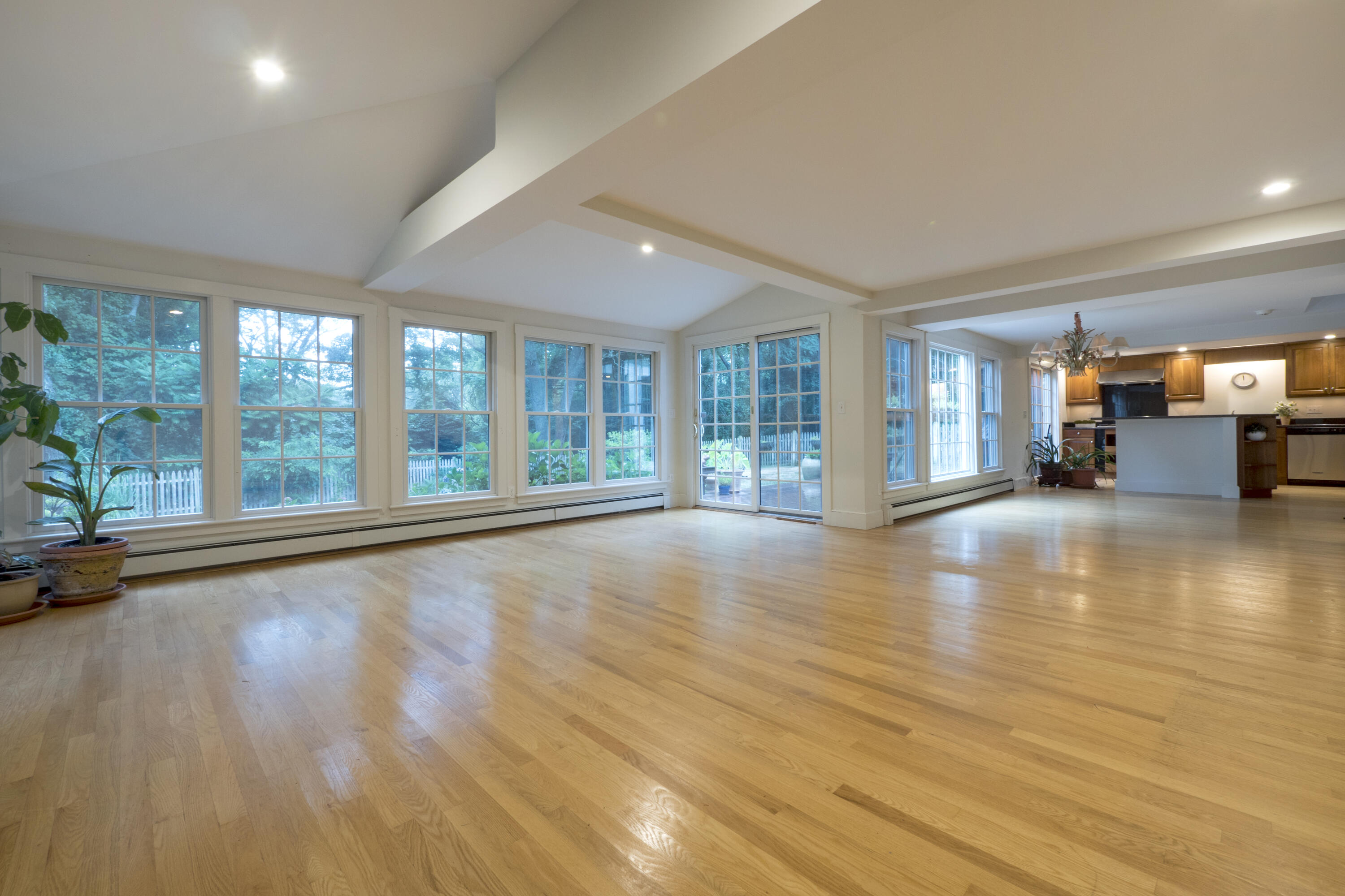 303 Maple Street West Barnstable, MA 02668 - Photo 15 of 19 a view of an empty room with glass door and windows