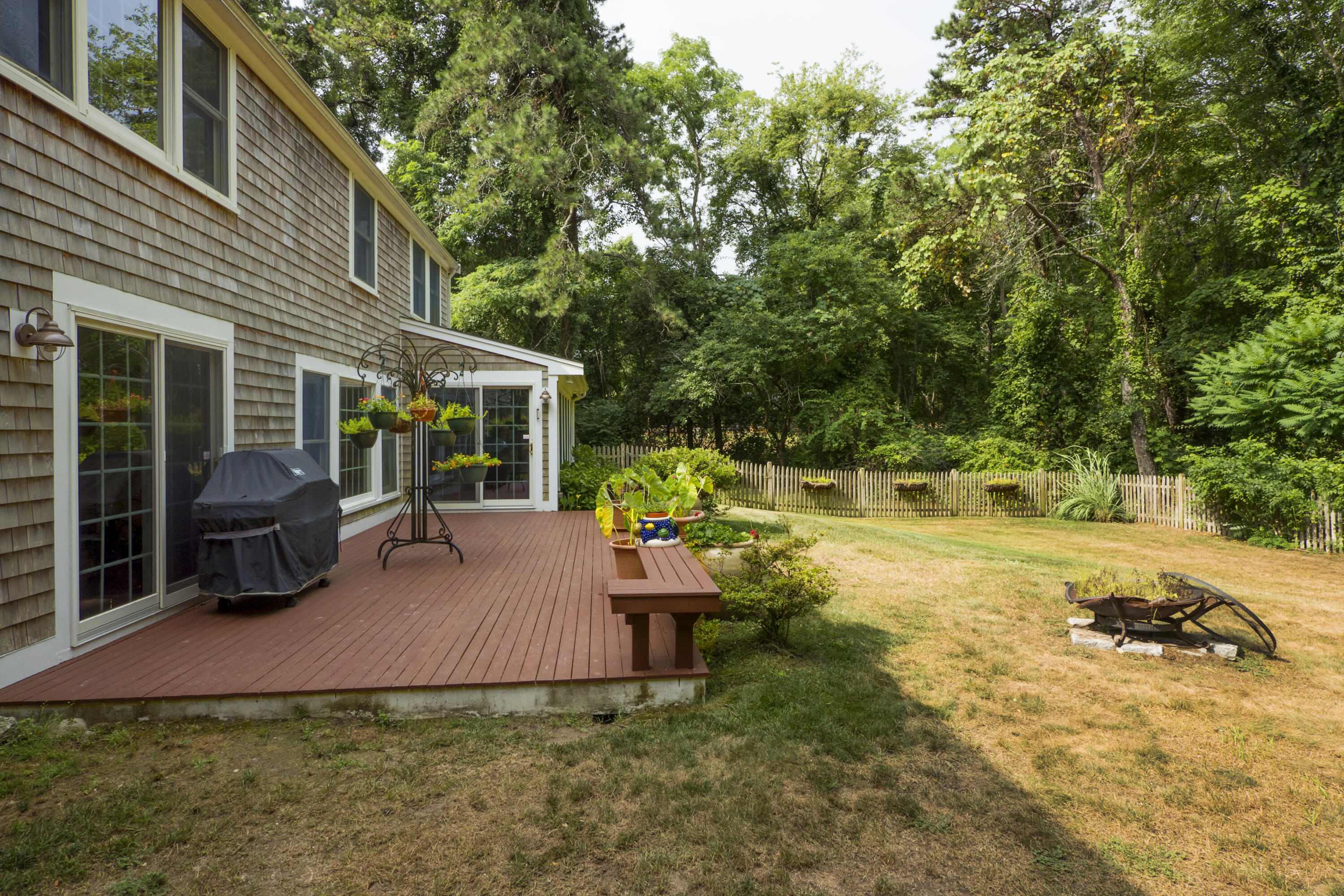 303 Maple Street West Barnstable, MA 02668 - Photo 18 of 19 a view of a house with backyard porch and sitting area