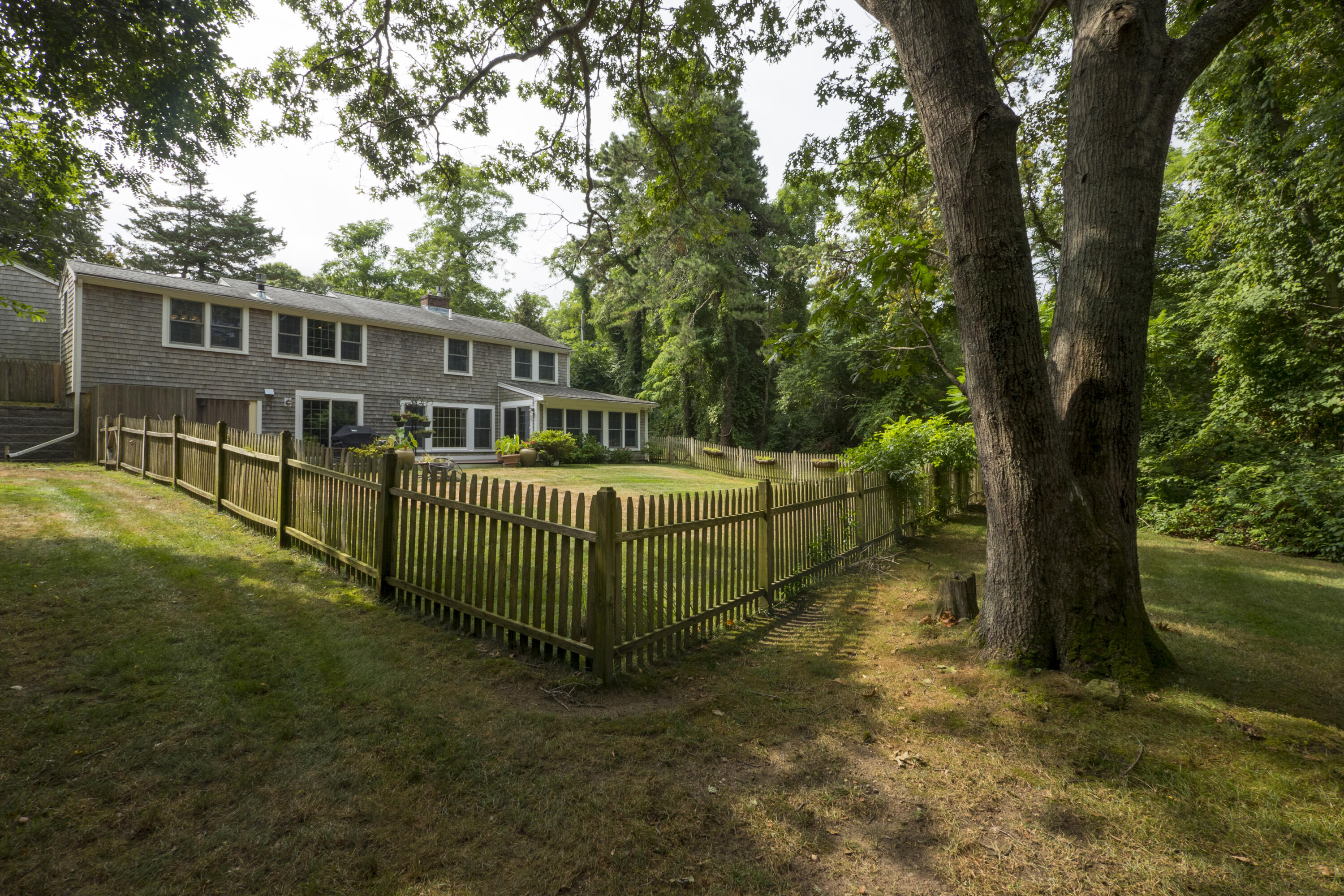 303 Maple Street West Barnstable, MA 02668 - Photo 19 of 19 a front view of a house with garden