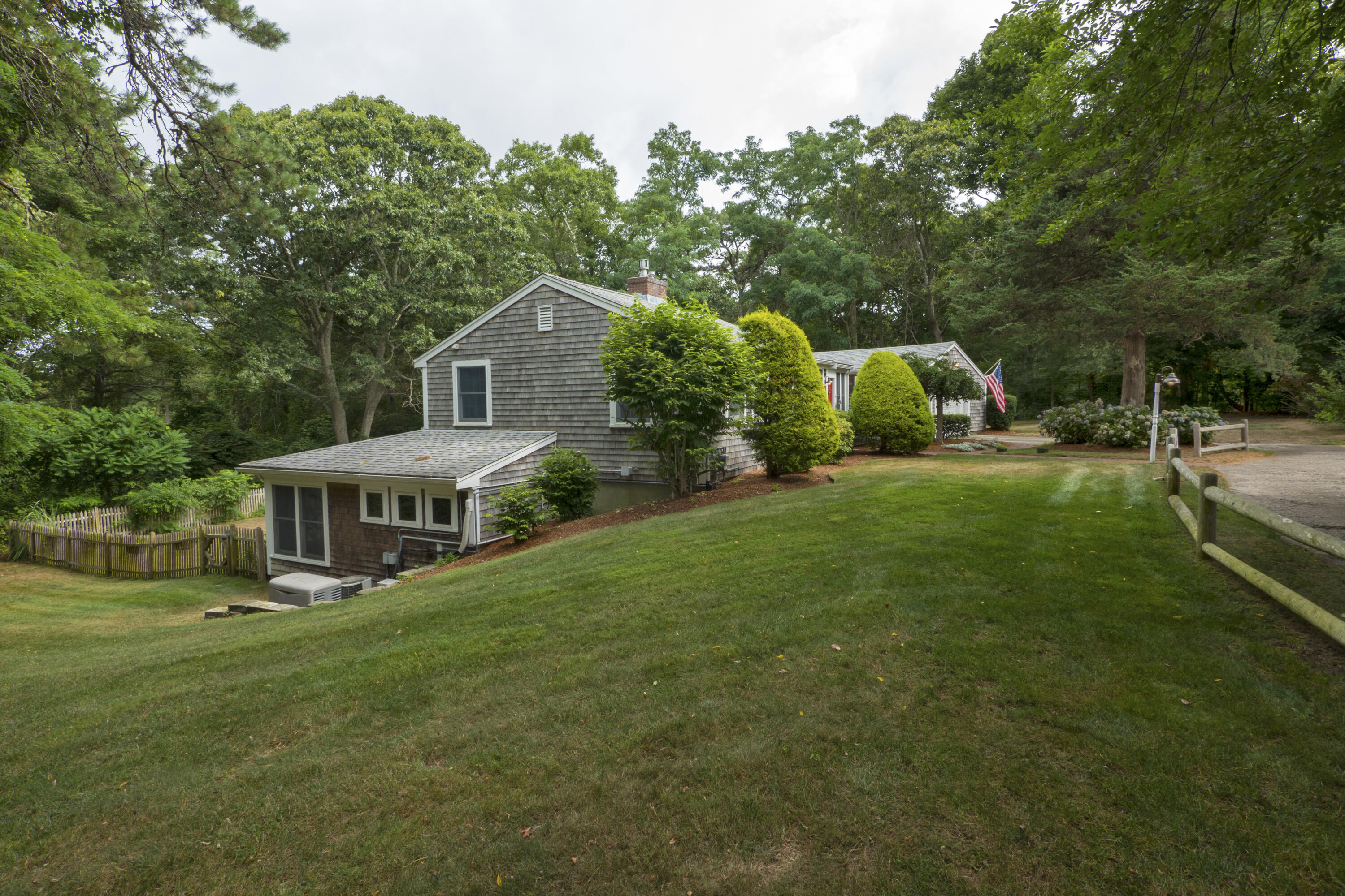 303 Maple Street West Barnstable, MA 02668 - Photo 2 of 19 a view of a house with a big yard