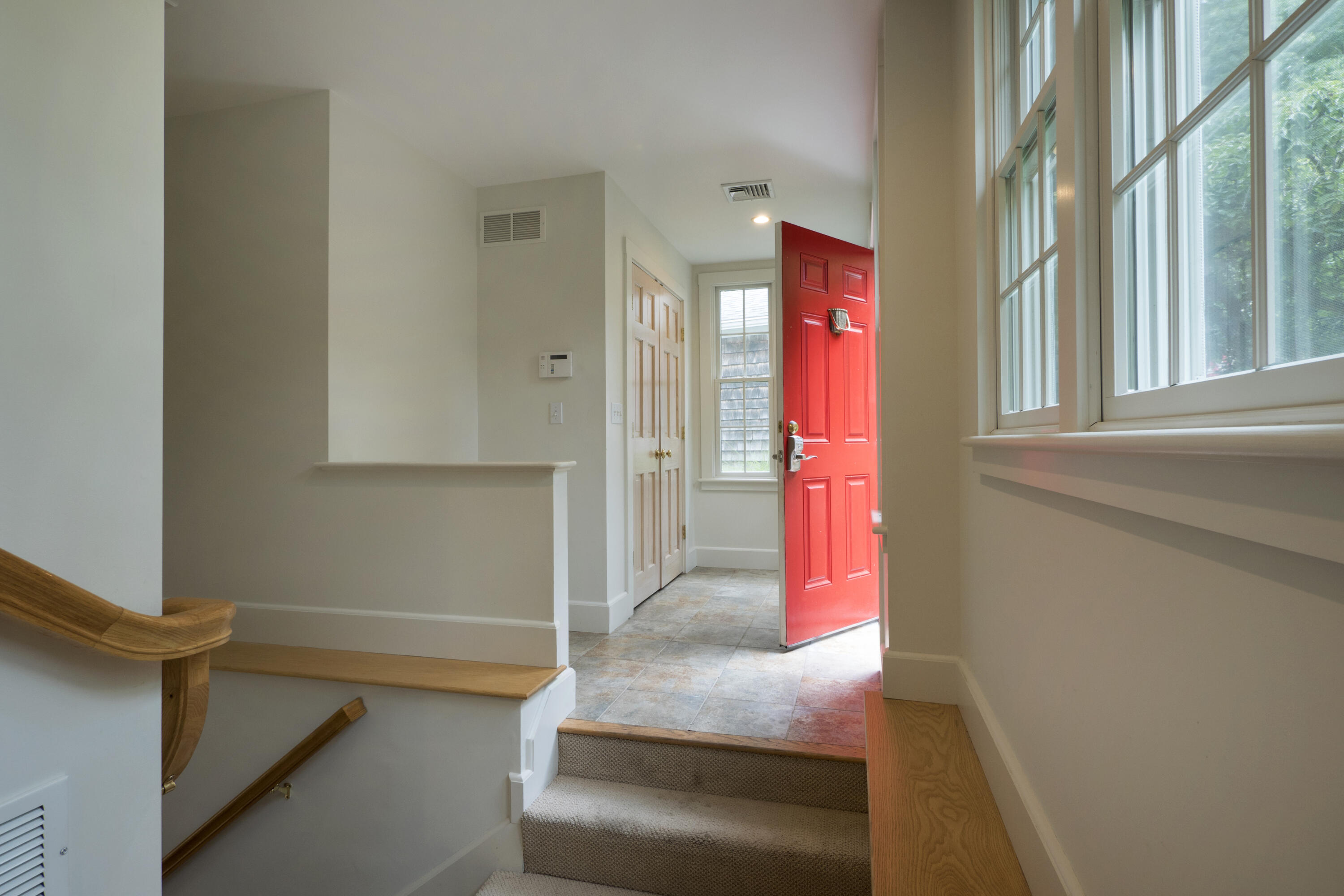 303 Maple Street West Barnstable, MA 02668 - Photo 5 of 19 a hallway with with a large window