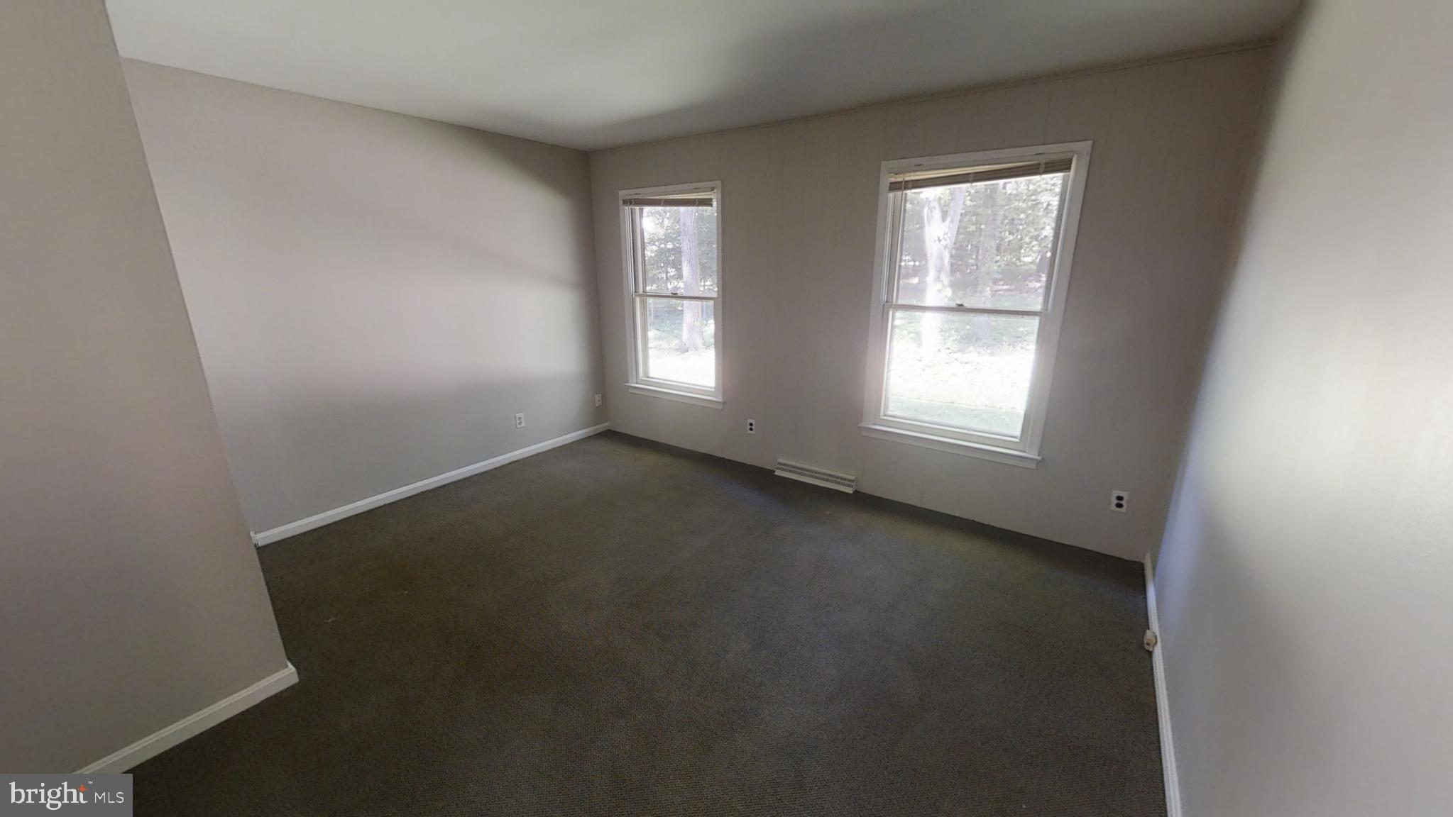 3842 Stoneybrook Road, Unit A White Plains, MD 20695 - Photo 12 of 33 an empty room with a window