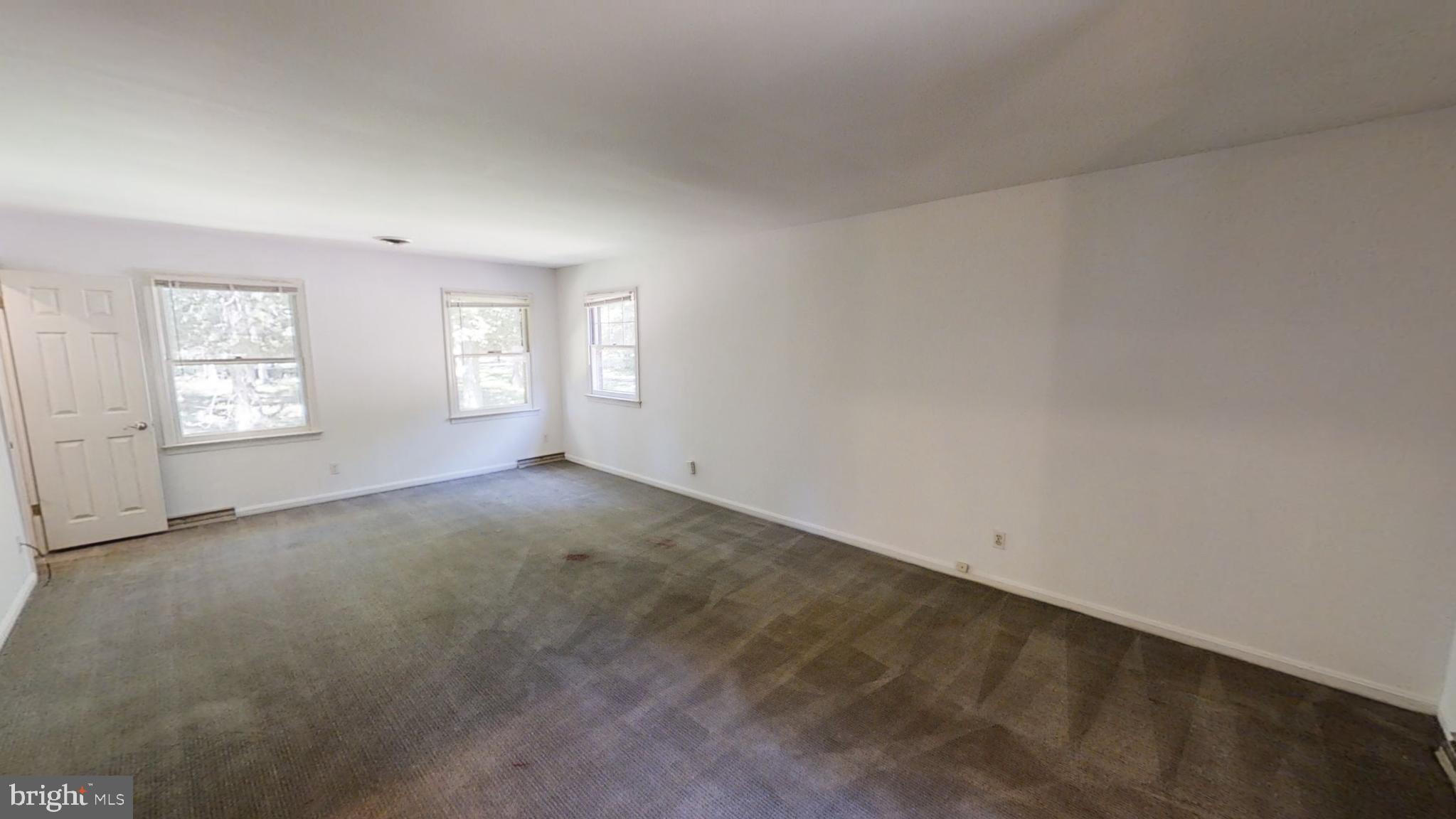 3842 Stoneybrook Road, Unit A White Plains, MD 20695 - Photo 19 of 33 an empty room with windows