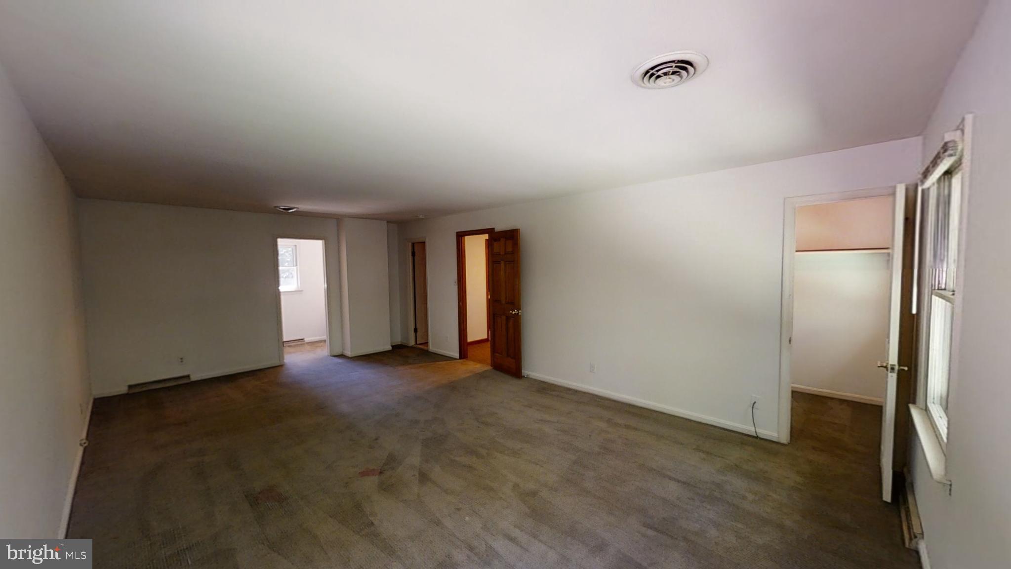 3842 Stoneybrook Road, Unit A White Plains, MD 20695 - Photo 20 of 33 a view of an empty room with window and closet area