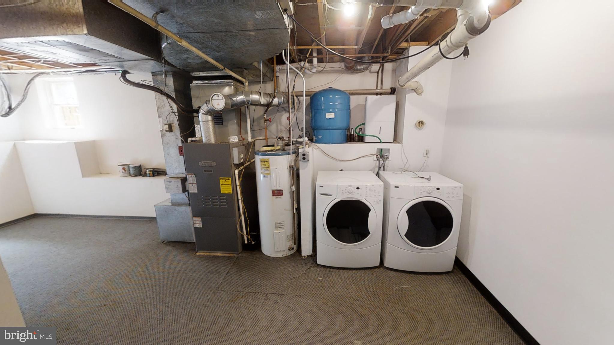 3842 Stoneybrook Road, Unit A White Plains, MD 20695 - Photo 26 of 33 a utility room with dryer and washer