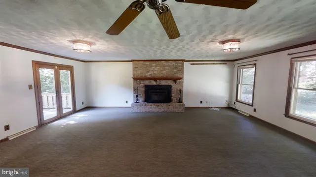 an empty room with windows