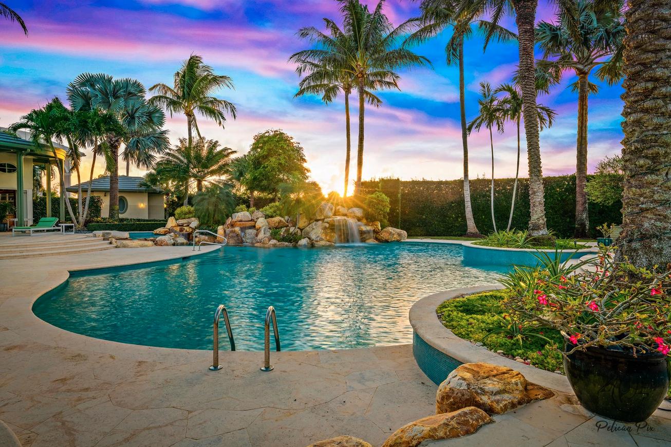 3131 Casseekey Island Road Jupiter, FL 33477 - Photo 11 of 57 pool twilight