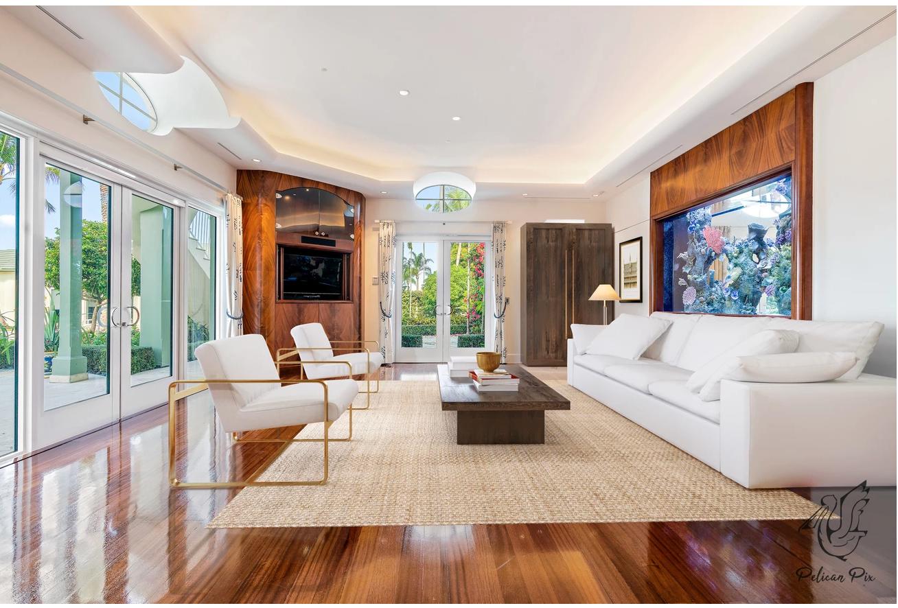 3131 Casseekey Island Road Jupiter, FL 33477 - Photo 27 of 57 FAMILY ROOM STAGED