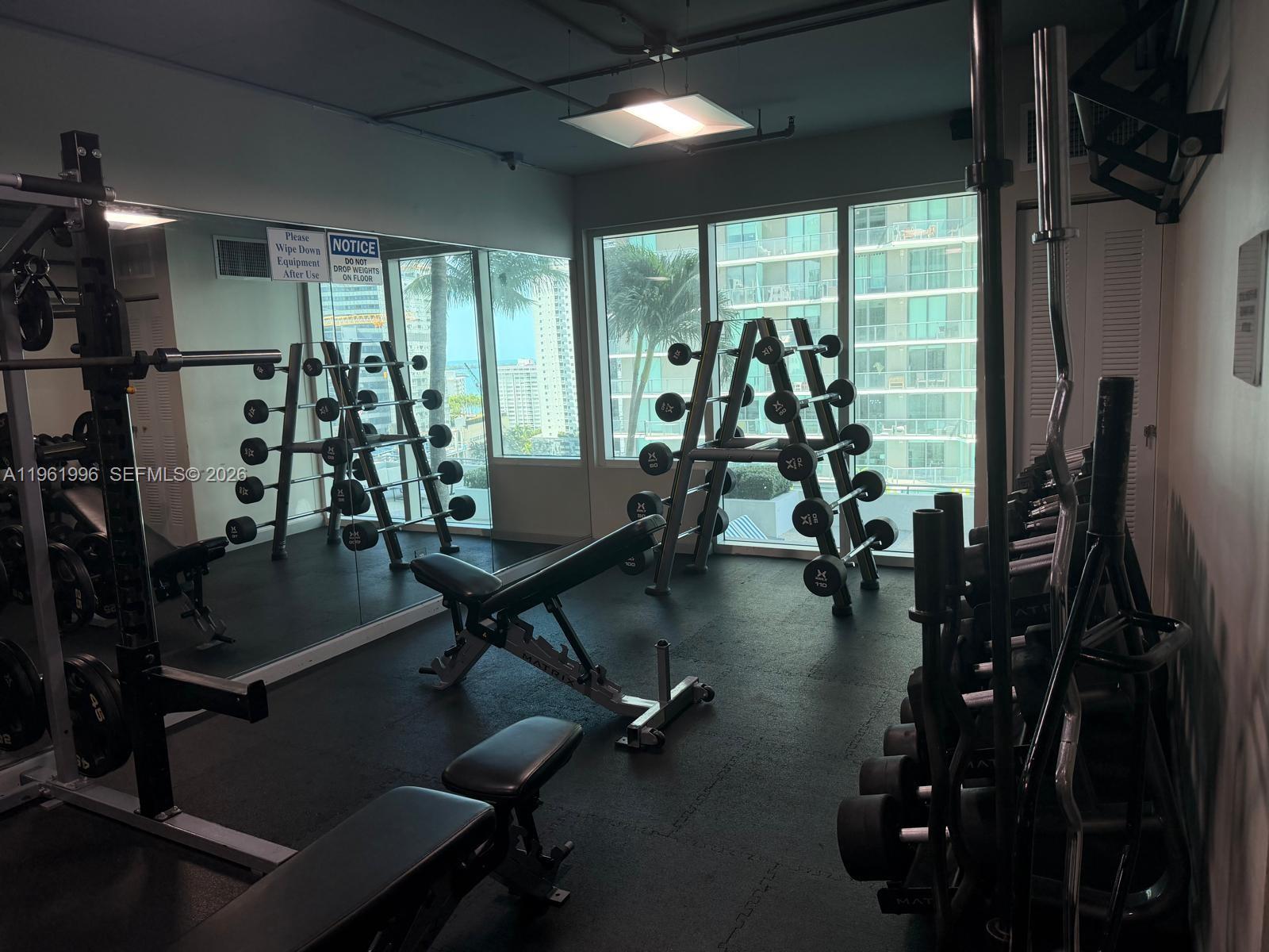 60 Southwest 13th Street, Unit 1107 Miami, FL 33130 - Photo 35 of 47 a view of a room with gym equipment