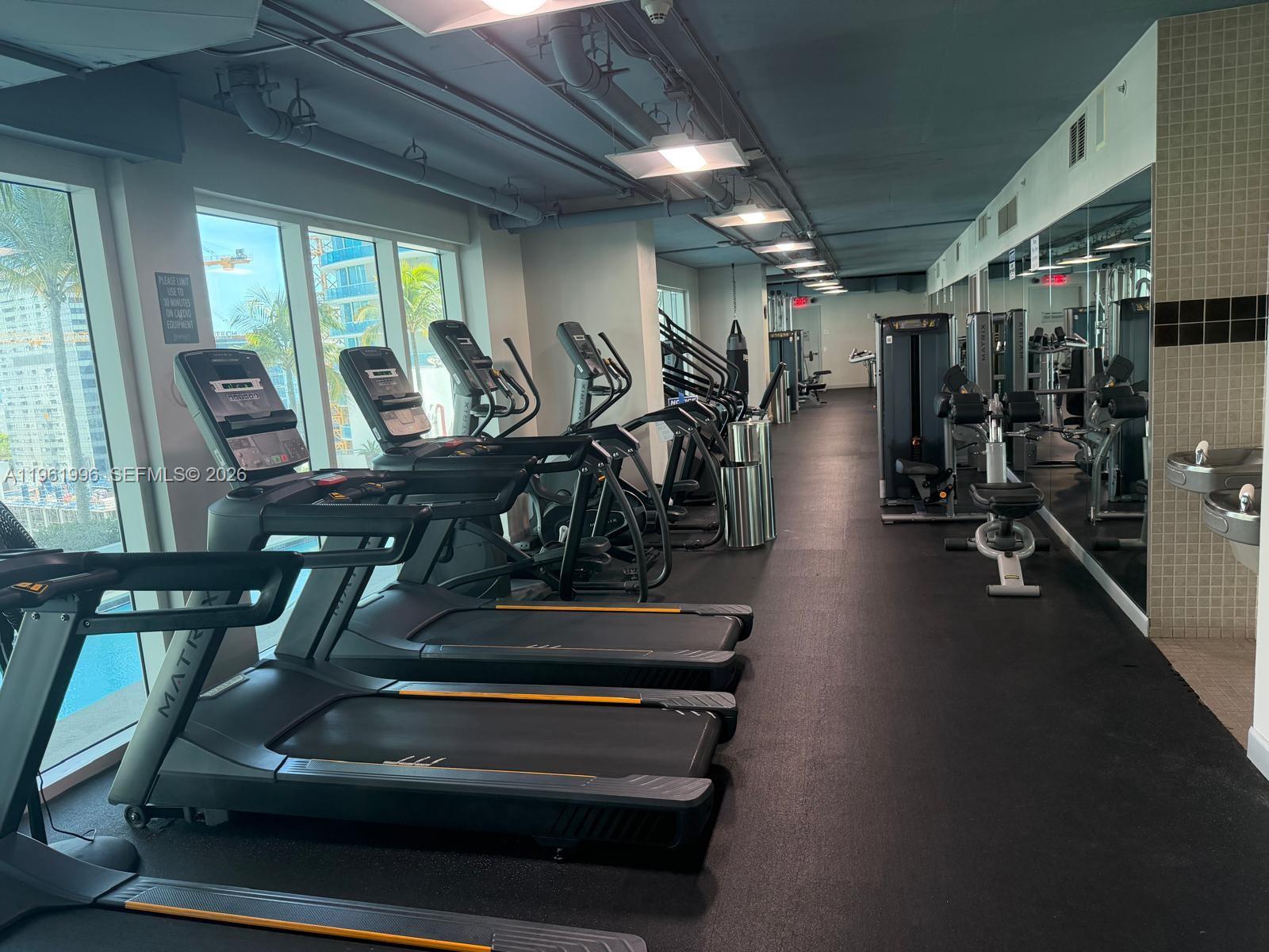 60 Southwest 13th Street, Unit 1107 Miami, FL 33130 - Photo 46 of 47 a view of a room with gym equipment