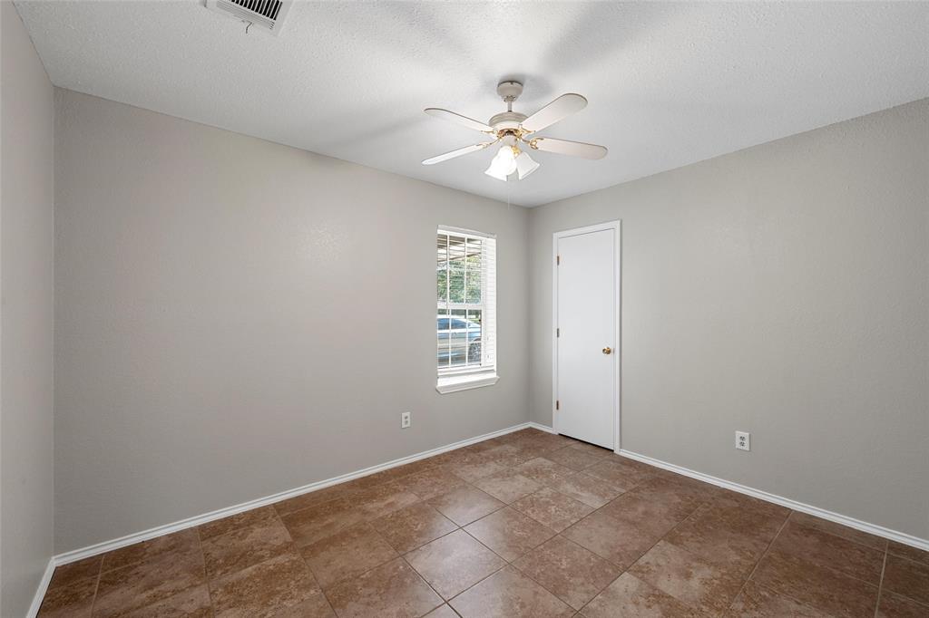 4609 Lexington Street Waco, TX 76705 - Photo 21 of 25 a view of an empty room with a window