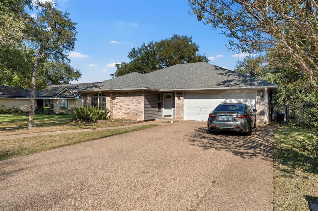 4609 Lexington Street Waco, TX 76705 - Photo 5 of 25 a car parked in front of a house