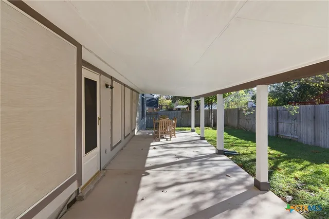 a view of a backyard with garden