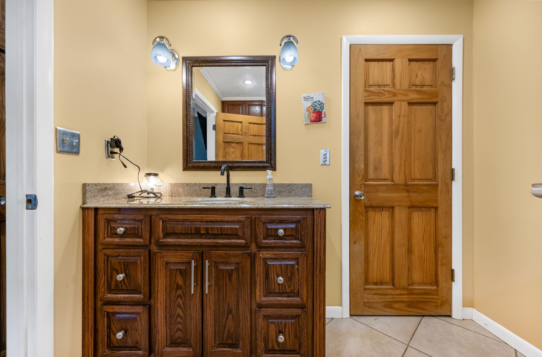 298 Langford Road Waverly, TN 37185 - Photo 19 of 53 a bathroom with a sink and a mirror