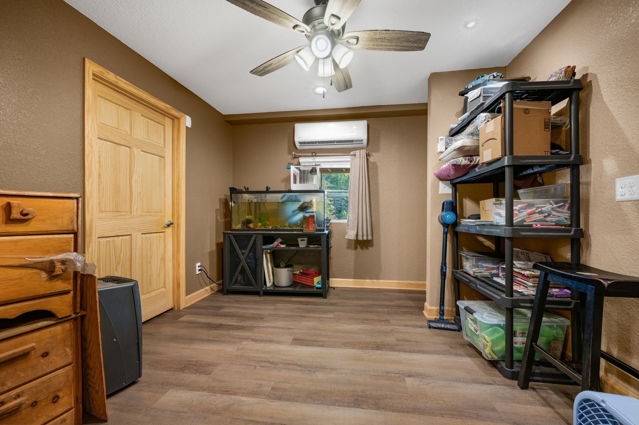 298 Langford Road Waverly, TN 37185 - Photo 24 of 53 a view of a livingroom with furniture and a flat screen tv