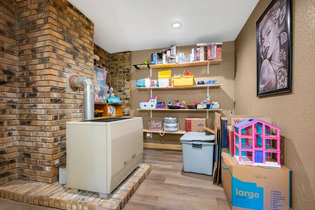 a room with furniture and a flat screen tv