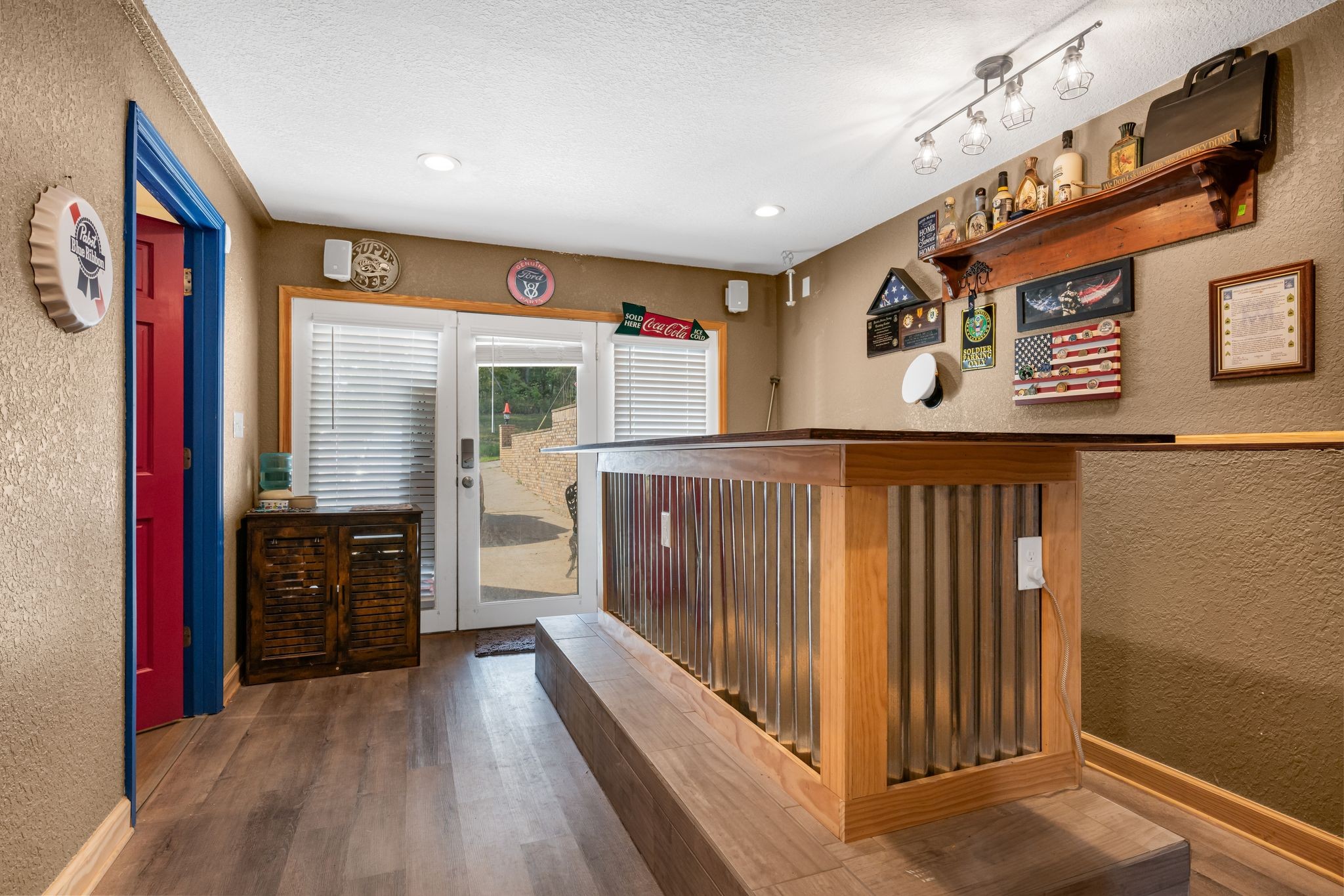 298 Langford Road Waverly, TN 37185 - Photo 27 of 53 a view of a hallway with wooden floor and furniture
