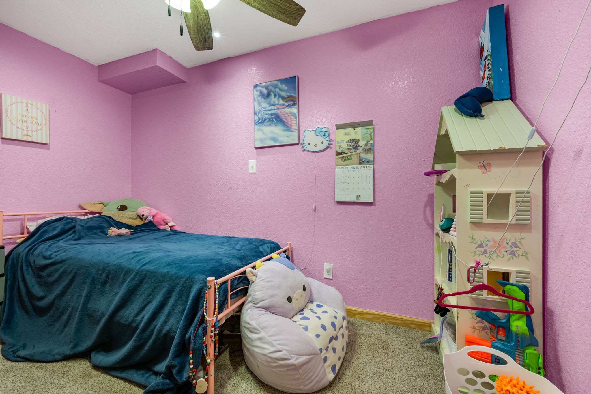 298 Langford Road Waverly, TN 37185 - Photo 29 of 53 a bed room with a bed and a couch