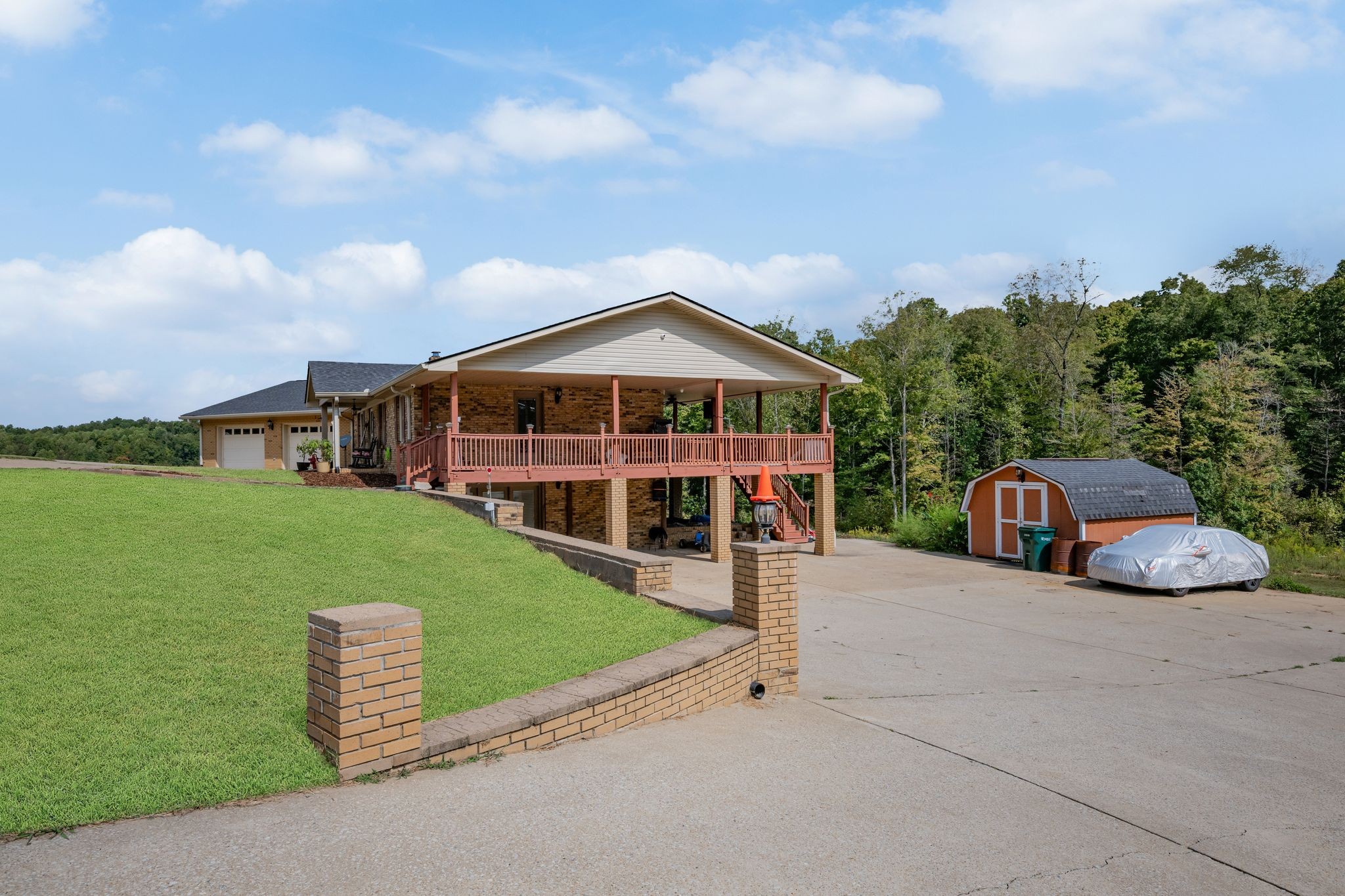 298 Langford Road Waverly, TN 37185 - Photo 36 of 53 a front view of a house with garden