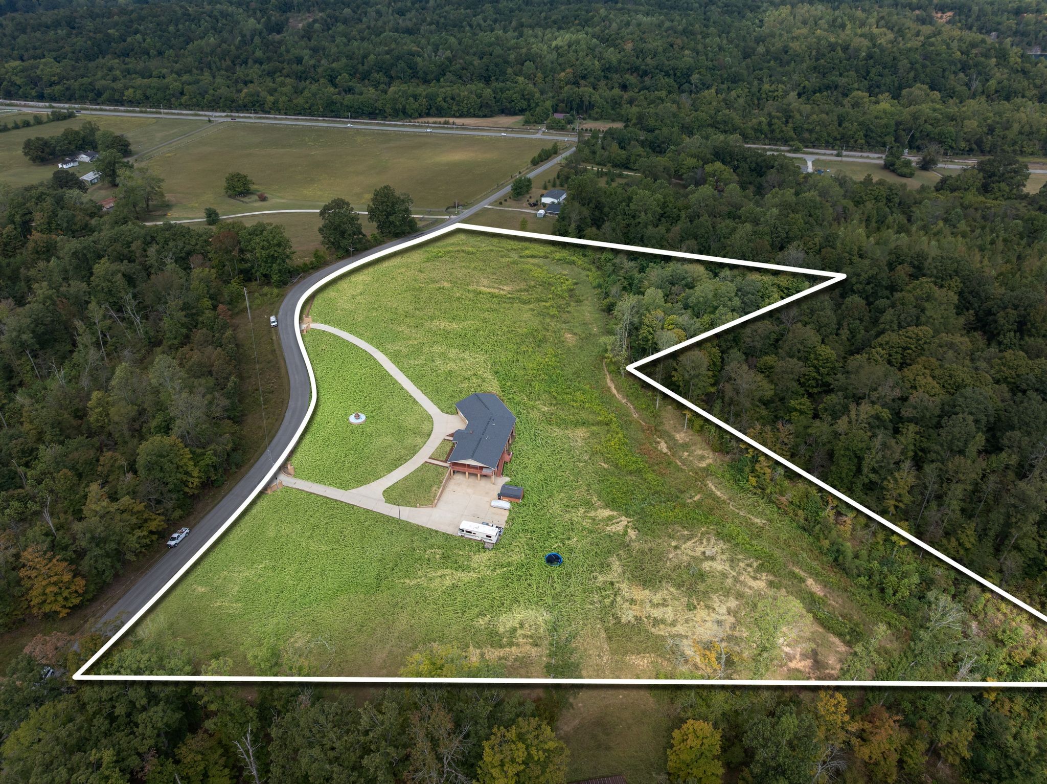 298 Langford Road Waverly, TN 37185 - Photo 40 of 53 a view of a tennis court