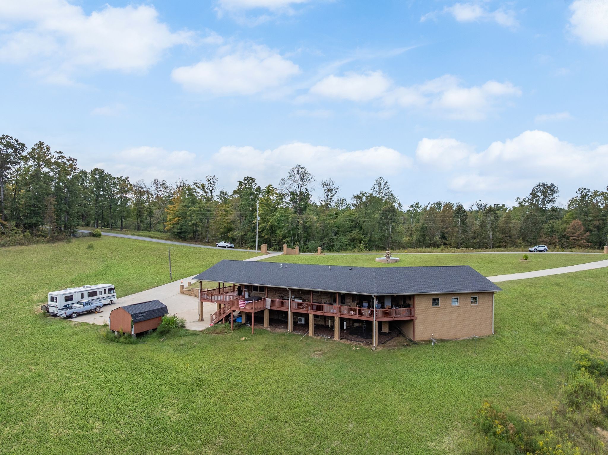 298 Langford Road Waverly, TN 37185 - Photo 46 of 53 a view of a big yard with table and chairs