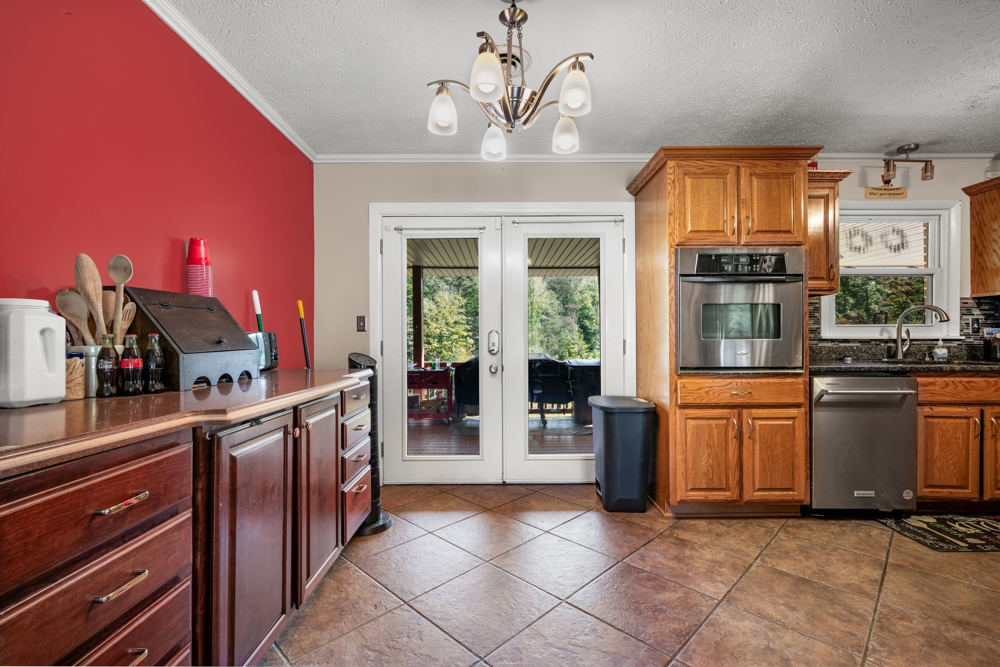 298 Langford Road Waverly, TN 37185 - Photo 9 of 53 a kitchen with stainless steel appliances granite countertop a refrigerator and a stove top oven
