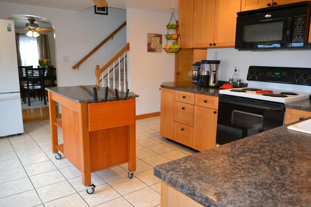279 Larch Street Woonsocket, RI 02895 - Photo 3 of 23 Kitchen to dining room 
