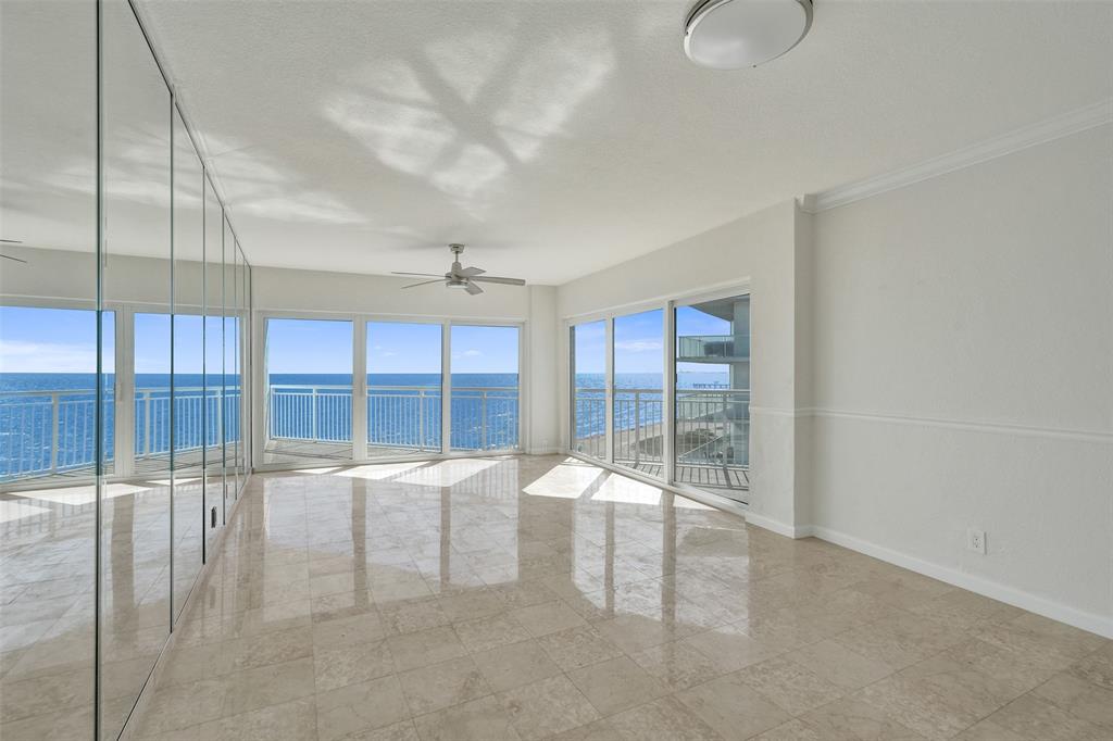 710 North Ocean Boulevard, Unit 910 Pompano Beach, FL 33062 - Photo 2 of 65 a view of an empty room with a window