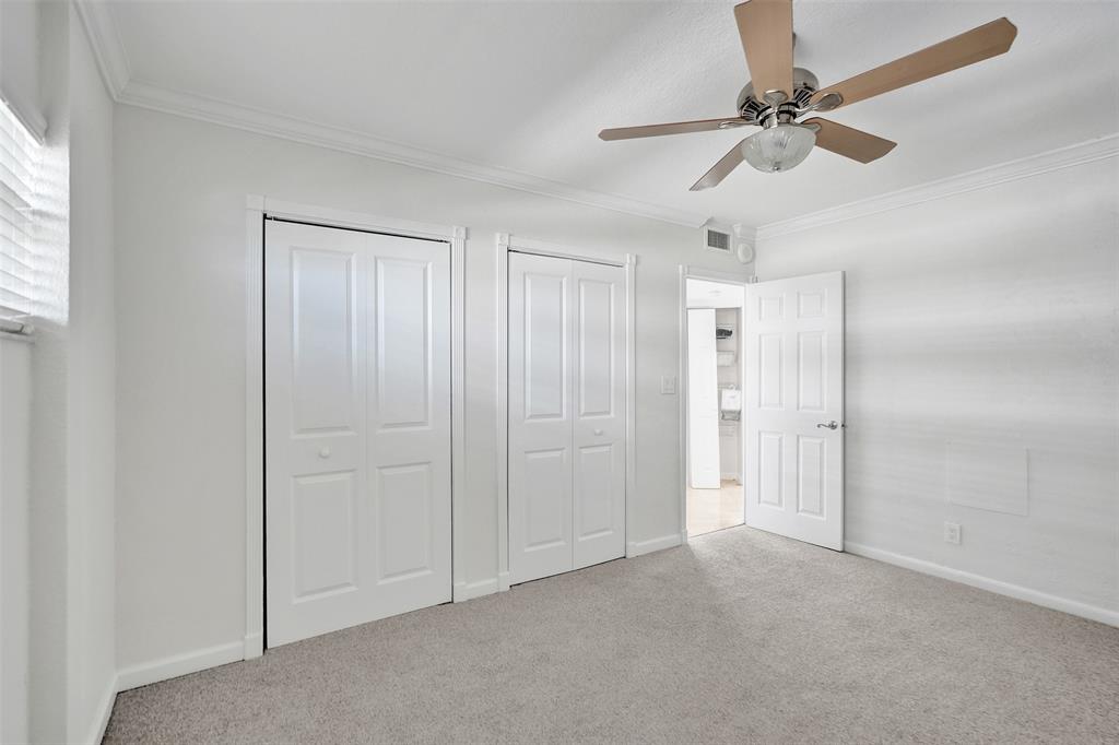 710 North Ocean Boulevard, Unit 910 Pompano Beach, FL 33062 - Photo 21 of 65 a view of empty room with window and ceiling fan