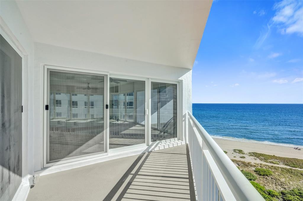 710 North Ocean Boulevard, Unit 910 Pompano Beach, FL 33062 - Photo 26 of 65 a view of a balcony with wooden floor