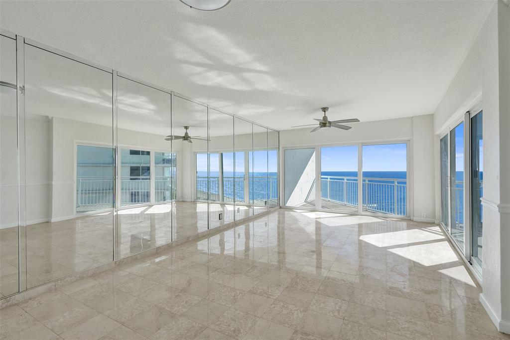 710 North Ocean Boulevard, Unit 910 Pompano Beach, FL 33062 - Photo 3 of 65 a view of an empty room with a window