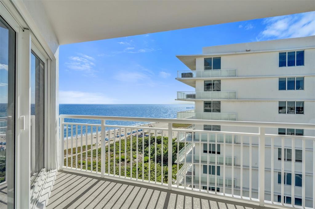 710 North Ocean Boulevard, Unit 910 Pompano Beach, FL 33062 - Photo 55 of 65 a view of a balcony with furniture