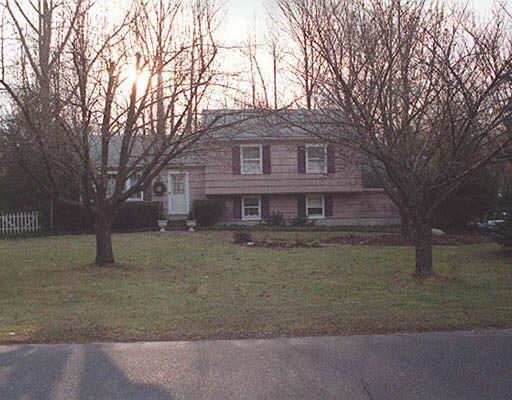 54 Ridgedale Road Bethel, CT 06801 - Photo 1 of 1 a front view of a house with a yard
